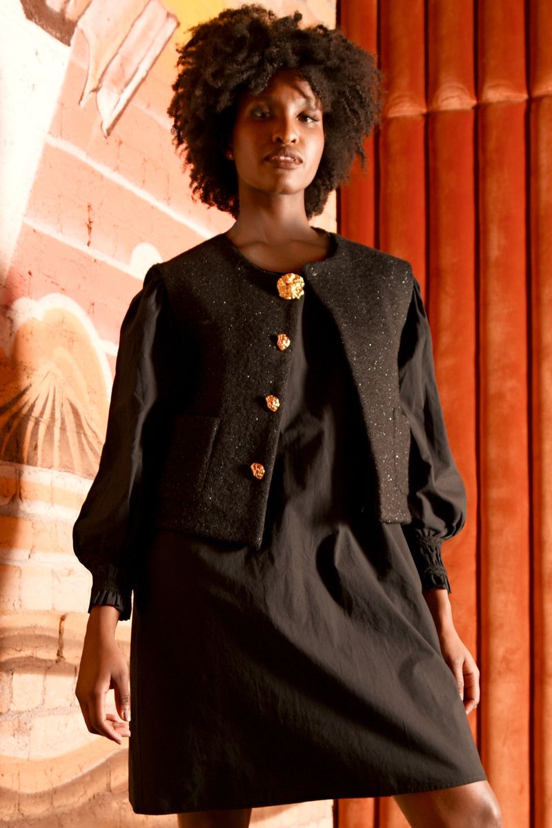 									THE SHIMMER TAKES ALL VEST
			