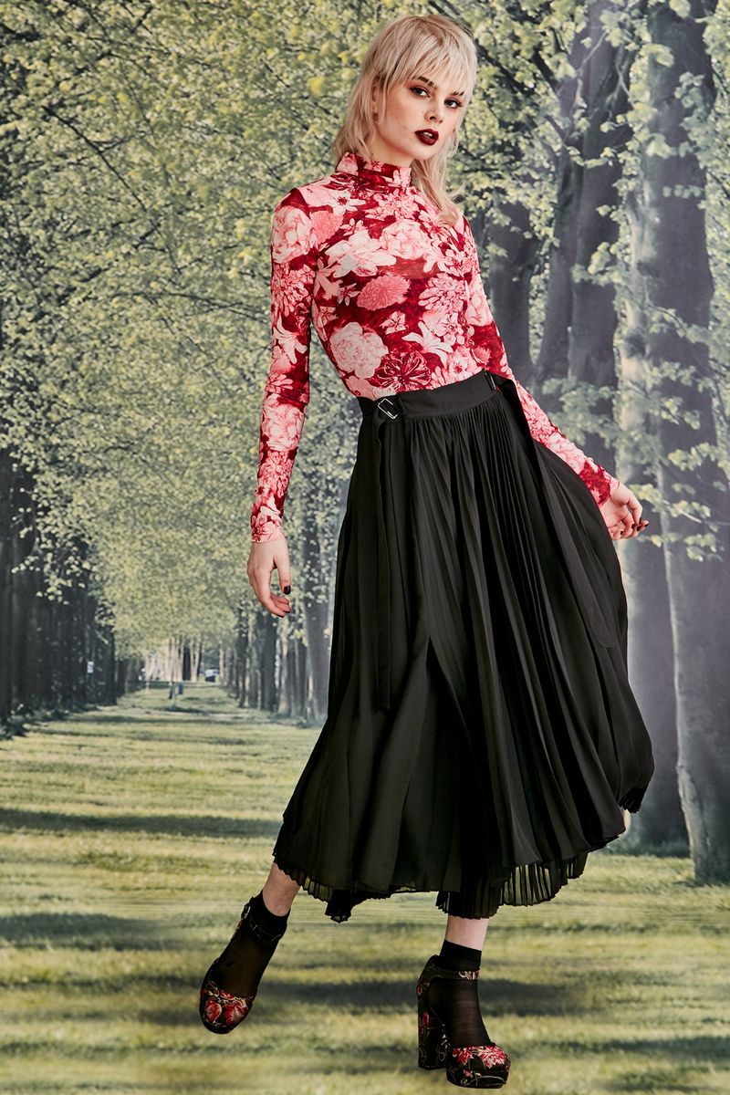 									NECK OF THE WOODS SKIVVY
								, 			PLEATING MOMENTS SKIRT
			