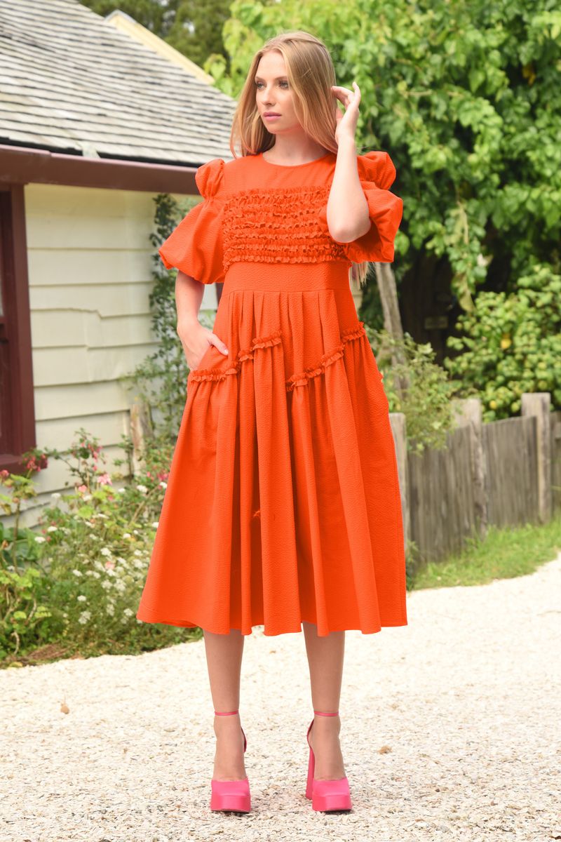 									FRILLS UP FRONT DRESS
			